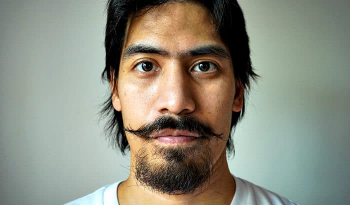 patchy hungarian handlebar mustache and beard