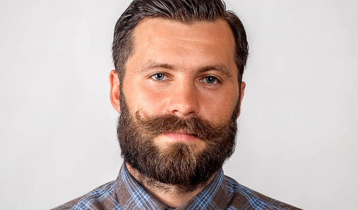 thick handlebar mustache with boxed beard